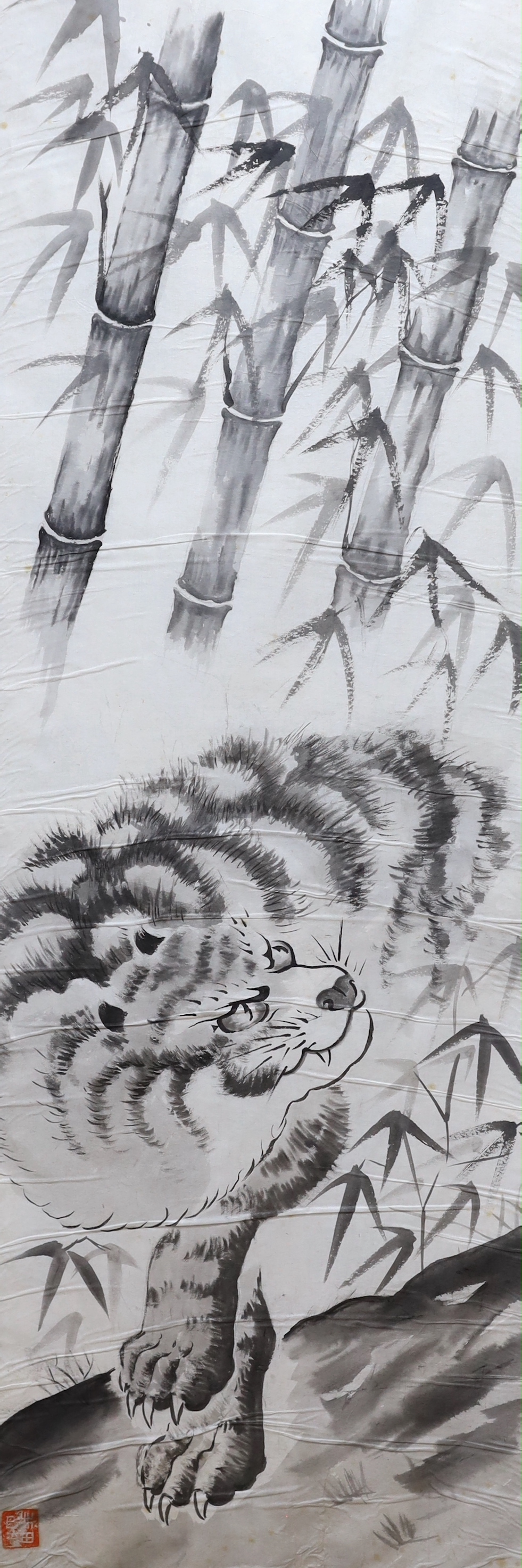 Hayashi Michkiken (Japanese late 20th century), watercolour scroll painting depicting a tiger and bamboo, inscribed and dated 64th year Showa for 1986, 119 x 40cm
